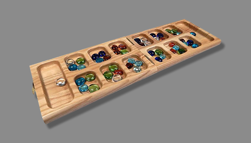 Imagem com o jogo Mancala.